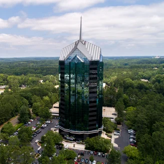 A completed energy efficient tower constructed with reflective paneling.