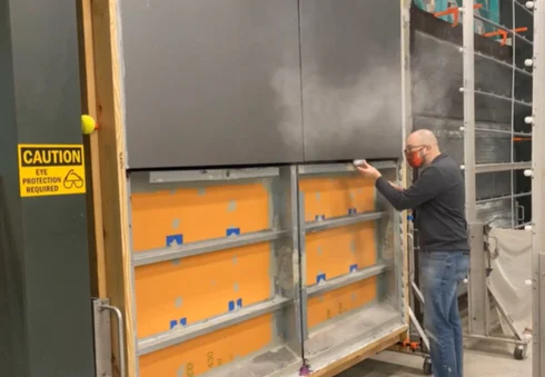 The Tremco test wall is assessing the air barrier of a specific panelized membrane for both permeability and structural integrity.