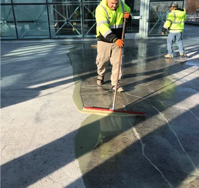 Concrete cracks are filled with flexible Tremco urethane sealant and the exterior flooring is sealed with a waterproof membrane.