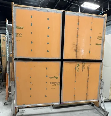 Test Wall Assembly at the Tremco CPG Building Science Laboratory demonstrating panels pre-applied with an air barrier membrane and foam joint seals.