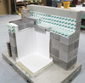 Example of a properly sealed parapet design at the Tremco CPG testing facility.