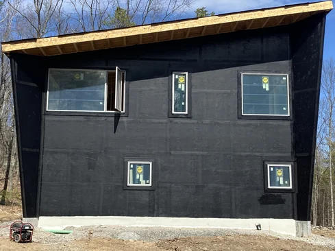 A weather-resistant barrier was installed on the exterior of the building to shield the interior from air and water infiltration.