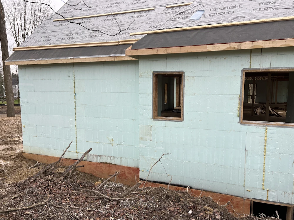 exterior of a structure built with blue insulated concrete forms